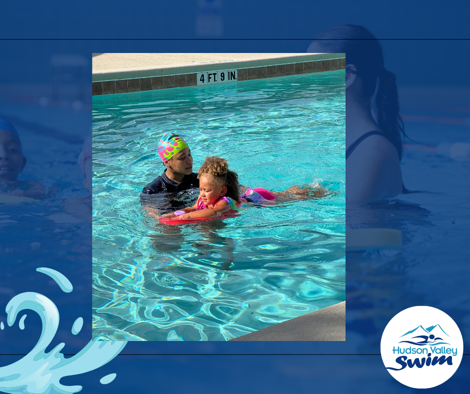 a swim teacher at hudson valley swim teaching a kid how to swim
