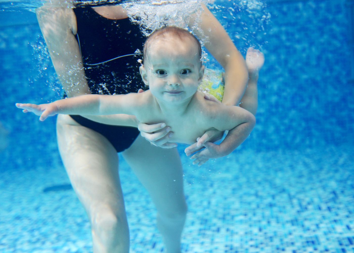 a baby swimming